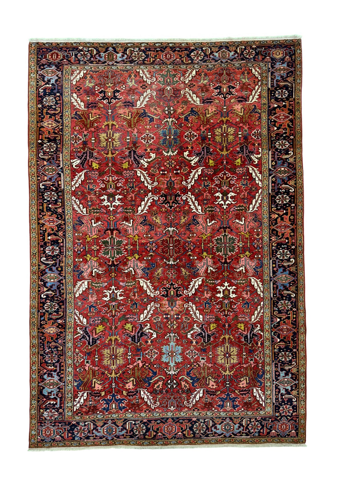 A rectangular traditional oriental rug with a deep red field, intricate floral motifs, and a dark navy blue border with beige and gold details, shown flat against a white background.
