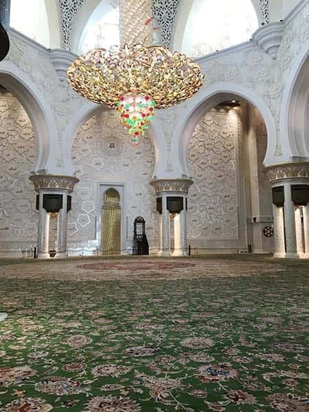 Persian rug and golden chandelier