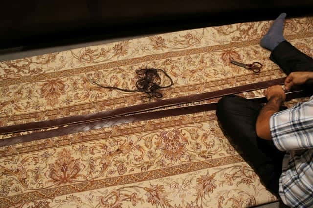 Rug repair and restoration and tips on how to clean a rug and take care of it.